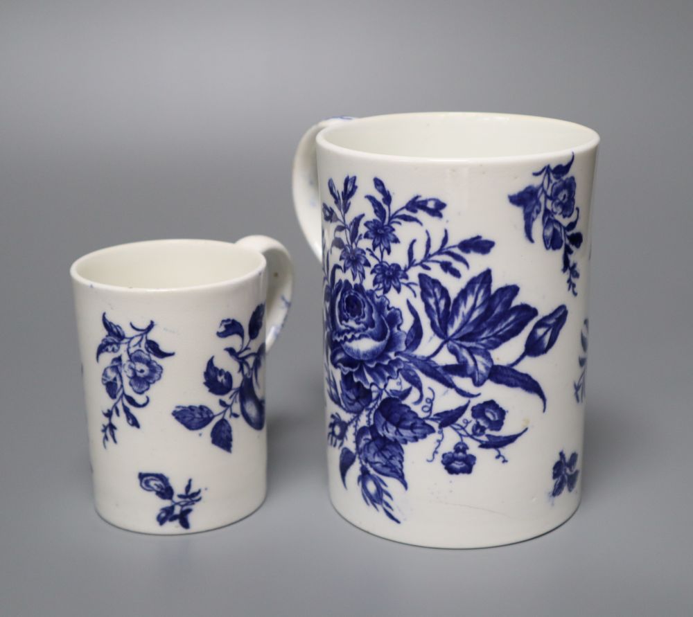 A Worcester style pine cone pattern bone china mug and a similar fruit decorated small mug, late 19th century, 12cm and 8cm